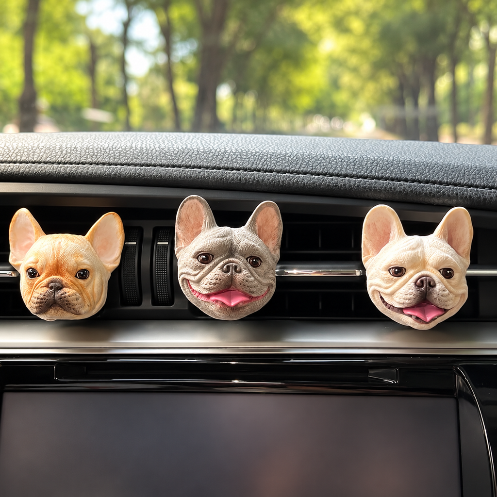 Three handmade French bulldog car vent aroma stone ornaments in a car